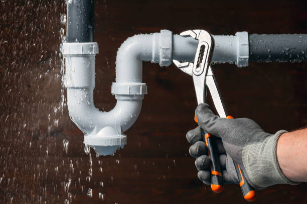 Professional Plumbing technician working in Home, PA